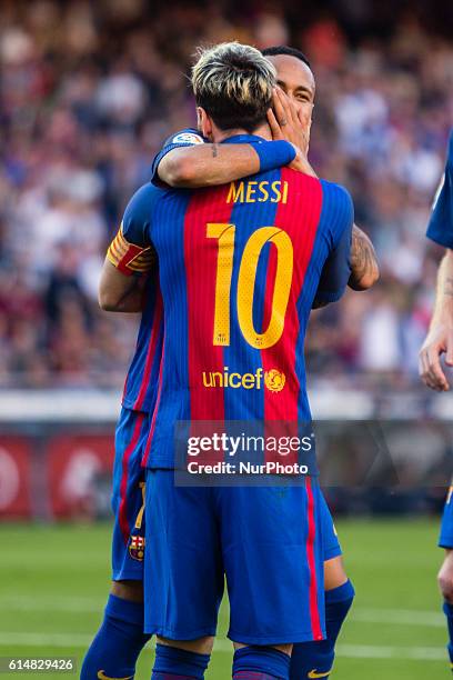 The FC Barcelona player Lionel Messi from Argentina celebrating his first goal of the match with Neymar from Brasil during the La Liga match between...