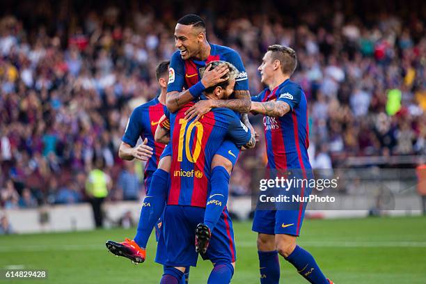 The FC Barcelona player Lionel Messi from Argentina celebrating his first goal of the match with Neymar from Brasil during the La Liga match between...