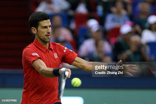 Novak Djokovic of Serbia returns a shot against Roberto Bautista Agut of Spain during the Men's singles semifinal match on day 7 of Shanghai Rolex...