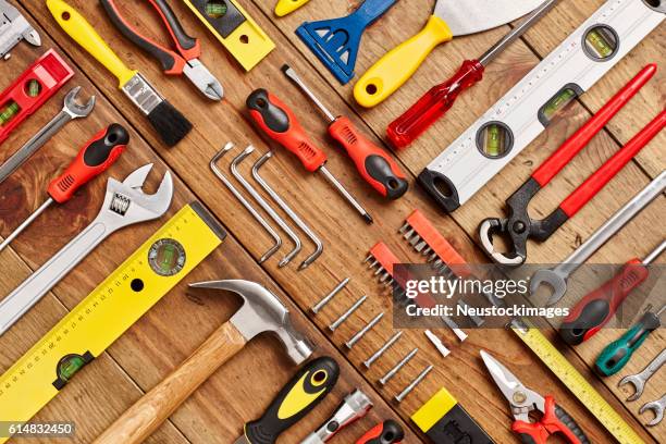 full frame shot of hand tools diagonally arranged on table - work tool 個照片及圖片檔