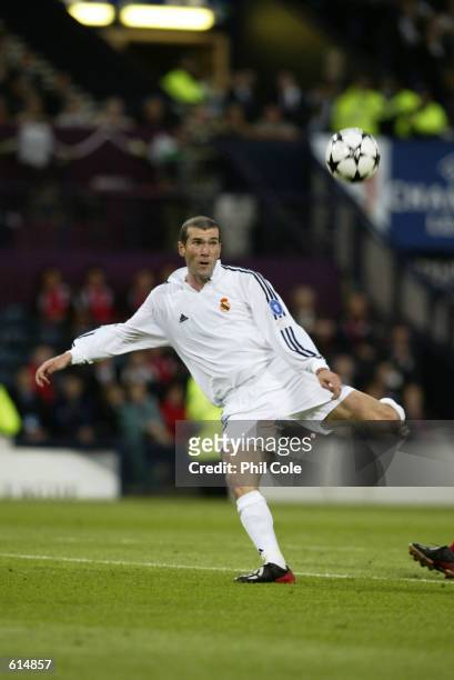 Zinedine Zidane of Real Madrid keeps his eye on the ball as he scores a wonderful goal during the UEFA Champions League Final between Real Madrid and...