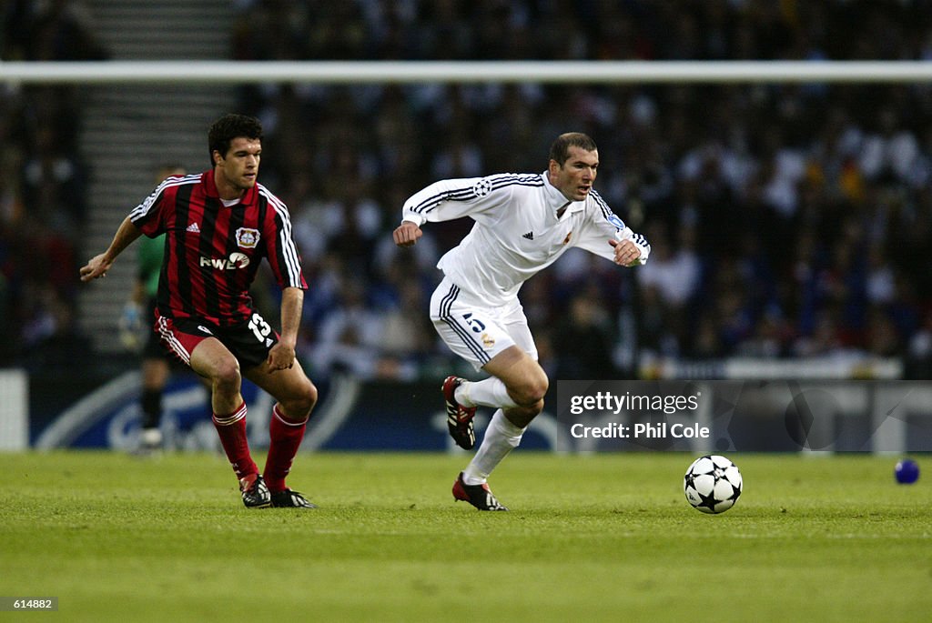 Zinedine Zidane of Real Madrid and Michael Ballack of Bayer Leverkusen