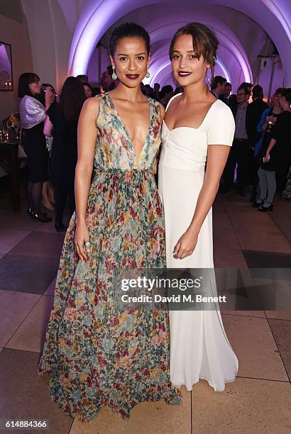 Gugu Mbatha-Raw and Alicia Vikander attend the BFI London Film Festival Awards during the 60th BFI London Film Festival at Banqueting House on...