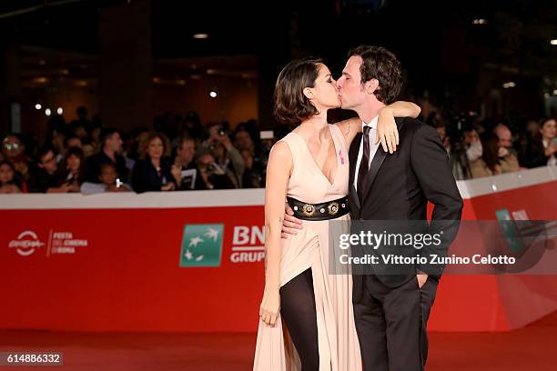 Andrea Delogu and Francesco Montanari walk a red carpet for 'Sole Cuore Amore' during the 11th Rome Film Festival at Auditorium Parco Della Musica on...