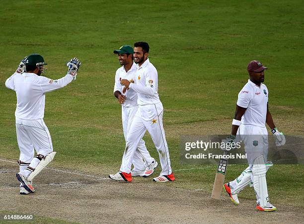 Darren Bravo of West Indies leaves the field after being dismissed by Mohammad Nawaz of Pakistan during Day Three of the First Test between Pakistan...