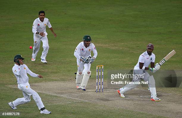 Azhar Ali of Pakistan takes a catch to dismiss Darren Bravo of West Indiesduring Day Three of the First Test between Pakistan and West Indies at...