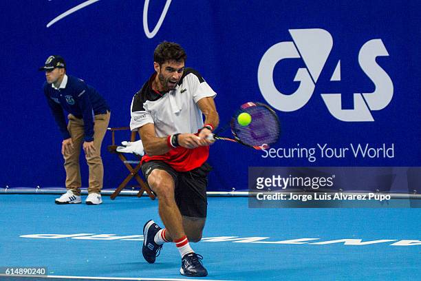Pablo Andujar of Spain returns a shot against Kimmer Coppejans of Belgium during the Men's singles Qualification match in day One of the European...