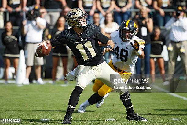 David Blough of the Purdue Boilermakers passes against the Iowa Hawkeyes in the second half of the game at Ross-Ade Stadium on October 15, 2016 in...