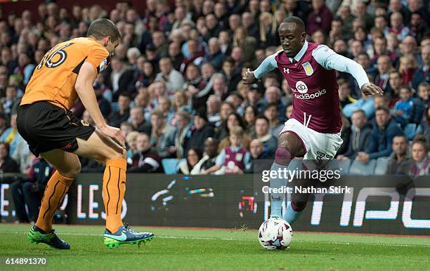 Albert Adomah of Aston Villa and Conor Coady of Wolverhampton Wanderers in action during the Sky Bet Championship match between Aston Villa and...