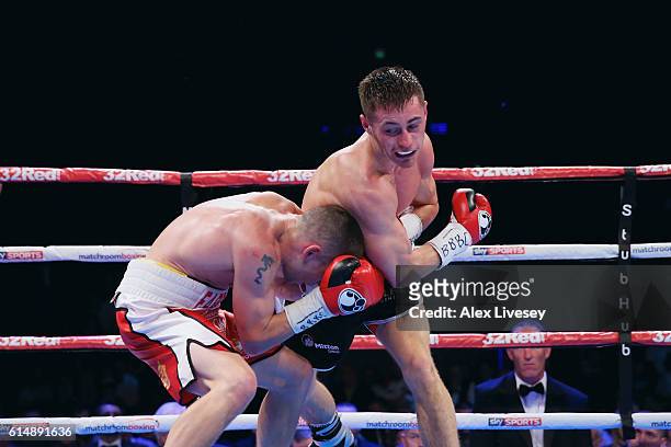 Ryan Farrag of England ducks a punch from Ryan Burnett of Northern Ireland in the British Bantamweight Championship match during Boxing at Echo Arena...