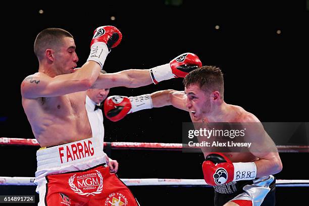 Ryan Burnett of Northern Ireland goes for a right hand punch on Ryan Farrag of England in the British Bantamweight Championship match during Boxing...