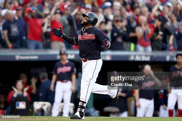 Carlos Santana of the Cleveland Indians celebrates after hitting a home run in the second inning against J.A. Happ of the Toronto Blue Jays during...