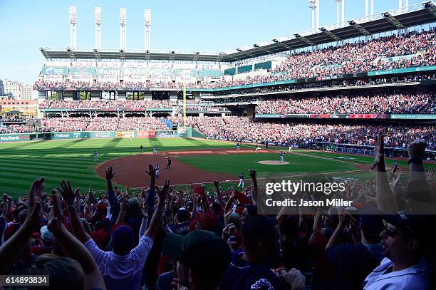 Carlos Santana of the Cleveland Indians celebrates after hitting a home run in the second inning against J.A. Happ of the Toronto Blue Jays during...