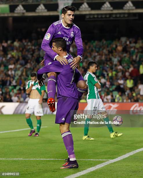 Cristiano Ronaldo and Alvaro Morata of Real Madrid celebrate after scoring during the Spanish league football match Real Betis Balompie vs Real...