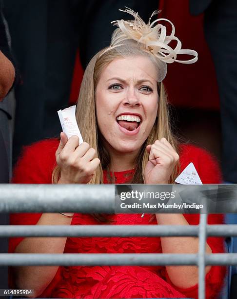 Paralympic Gold Medalist Hannah Cockroft cheers whilst watches the racing as she attends the QIPCO British Champions Day racing meet at Ascot...