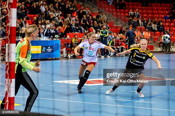 Savehof Player Emma Ekenman-Fernis and Larvik HK's Gro Hammerseng-Edin fights for the return as Sandra Toft cheers for a saved penalty in the game...