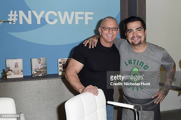 Chefs Robert Irvine and Aaron Sanchez attend the Food Network & Cooking Channel New York City Wine & Food Festival Presented By Coca-Cola - Grand...