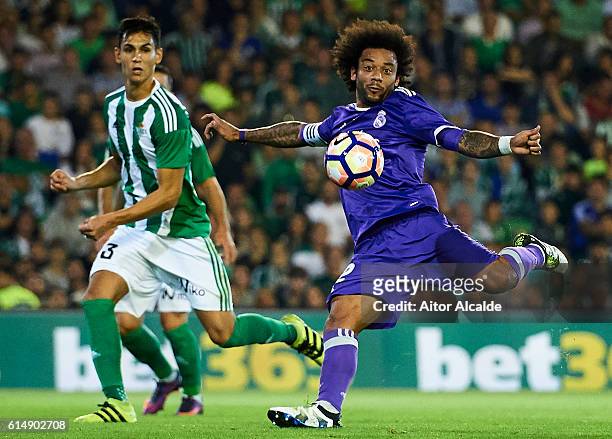 Marcelo of Real Madrid CF shoots for score a goal during the match between Real Betis Balompie and Real Madrid CF as part of La Liga at Benito...