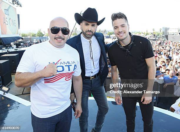 Lupillo Rivera, Jomari Goyso and William Valdes are seen on stage during the Univision and Fusion RiseUp As One concert at CBX on October 15, 2016 in...