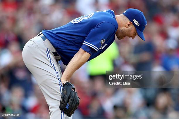 Happ of the Toronto Blue Jays reacts in the fifth inning against the Cleveland Indians during game two of the American League Championship Series at...