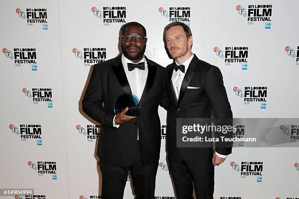 Steve McQueen and Michael Fassbender poses in the winner's room at BFI London Film Festival Awards during the 60th BFI London Film Festival at...