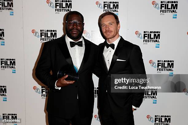 Steve McQueen and Michael Fassbender poses in the winner's room at BFI London Film Festival Awards during the 60th BFI London Film Festival at...