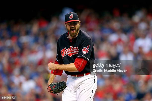 Andrew Miller of the Cleveland Indians celebrates after striking out Josh Donaldson of the Toronto Blue Jays in the top of the eighth inning during...