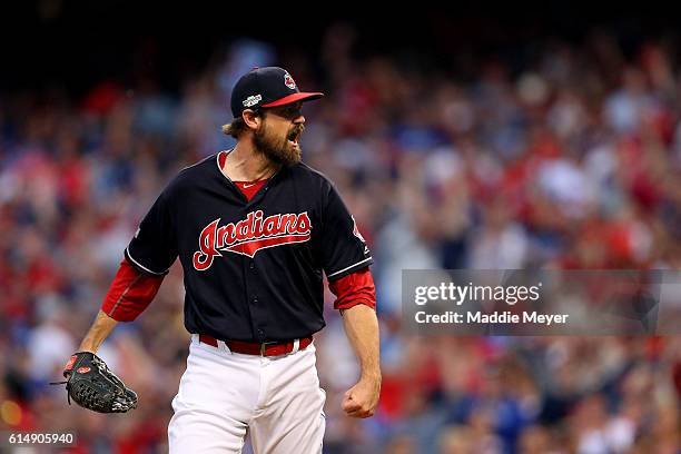 Andrew Miller of the Cleveland Indians celebrates after striking out Josh Donaldson of the Toronto Blue Jays in the top of the eighth inning during...