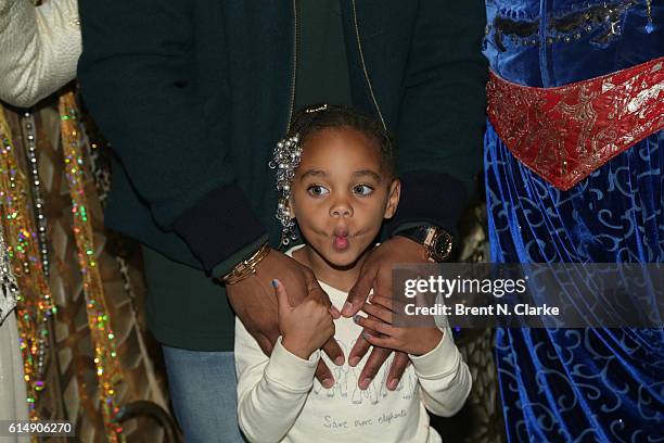 Kennedy Cruz, daughter of professional football player Victor Cruz, poses for photographs after attending "Aladdin" on Broadway at the New Amsterdam...