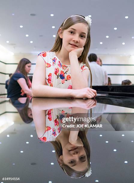 Year-old Alma Deutscher poses for a photographer in The Wiener Musikverein in Vienna on October 6, 2016. The British 11-year-old's opera 'Cinderella'...