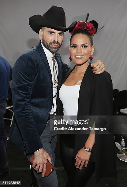 Jomari Goyso and Karina Banda pose backstage during Univision and Fusion RiseUp As One Concert at CBX on October 15, 2016 in San Diego, California.