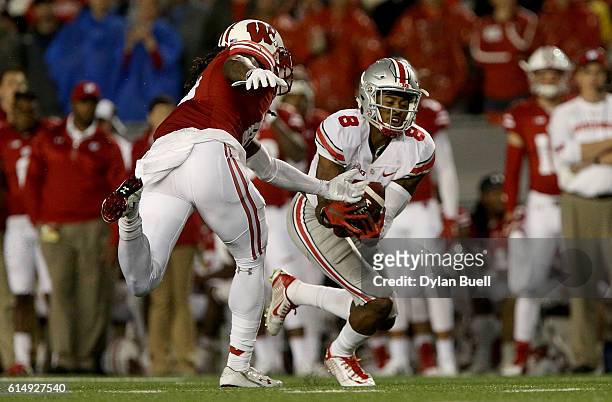 Gareon Conley of the Ohio State Buckeyes makes an interception in the third quarter against the Wisconsin Badgers at Camp Randall Stadium on October...