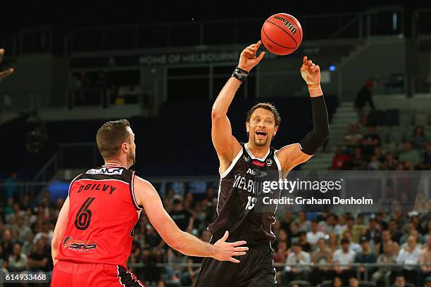 David Andersen of Melbourne United passes during the round two NBL match between Melbourne United and the Illawarra Hawks on October 16, 2016 in...