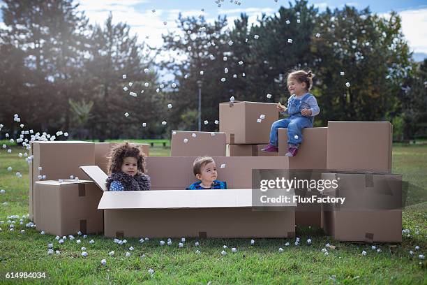 Children With Box 569 Black Children Playing In Cardboard Box Stock Photos, High-Res ...