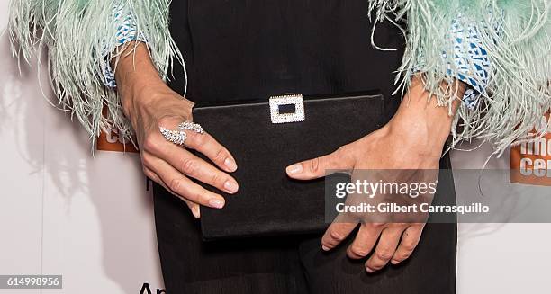 Actress Sienna Miller, jewelry and handbag detail, attends the Closing Night Screening of 'The Lost City Of Z' for the 54th New York Film Festival at...