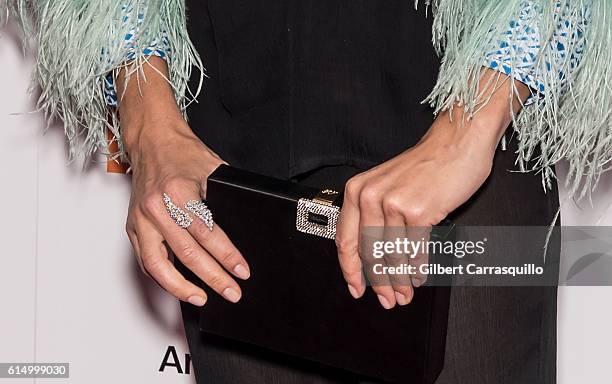 Actress Sienna Miller, jewelry and handbag detail, attends the Closing Night Screening of 'The Lost City Of Z' for the 54th New York Film Festival at...