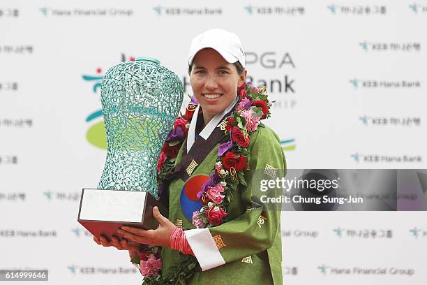 Carlota Ciganda of Spain lifts the winners trophy during a ceremony following the LPGA KEB-Hana Bank Championship at the Sky 72 Golf Club Ocean...