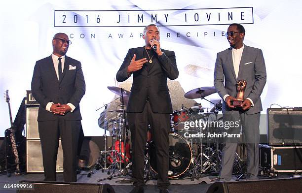 Andre Harrell, REVOLT Vice Chairman and Chair of the REVOLT Music Conference, Nas, and Sean 'Diddy' Combs on stage at the 2016 REVOLT Music...