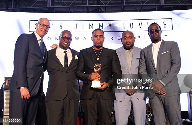 Derek Ferguson, REVOLT Media COO, Andre Harrell, REVOLT Vice Chairman and Chair of the REVOLT Music Conference, Nas, Steve Stoute, and Sean 'Diddy'...