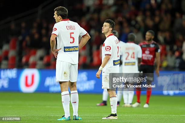 Renato Civelli and Sebastien Corchia of Lille during the Ligue 1 match between EA Guingamp and Lille OCS at Stade du Roudourou on October 15, 2016 in...