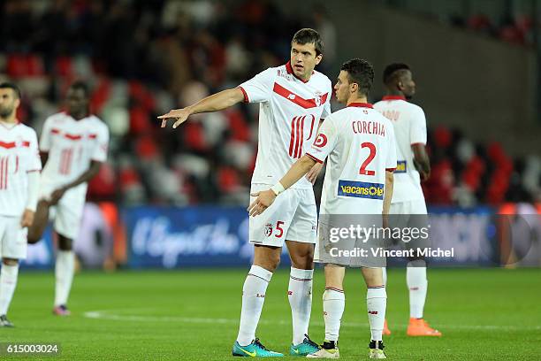 Renato Civelli of Lille and Sebastien Corchia of Lille during the Ligue 1 match between EA Guingamp and Lille OCS at Stade du Roudourou on October...