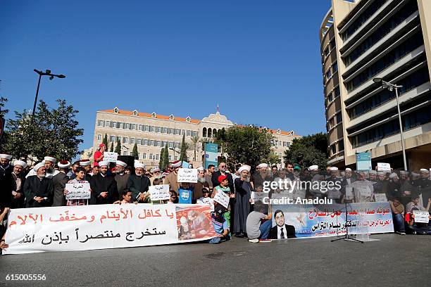 Lebanese gather at Riad Al Solh Square, to protest against the detainment of Rashaya district's former mufti, Sheik Bessam et-Tras, in Beirut,...