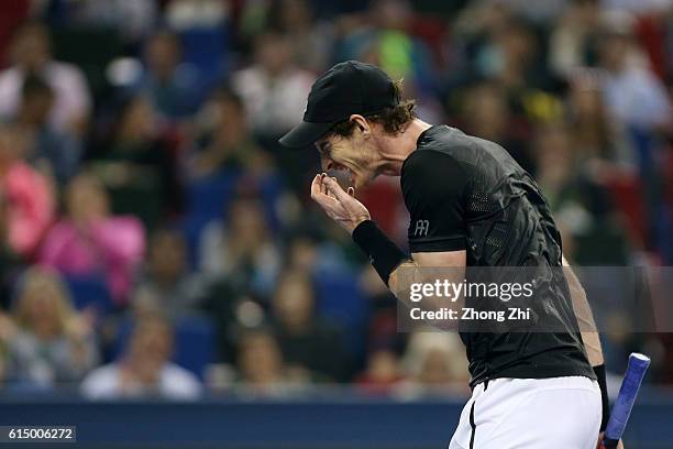 Andy Murray of Great Britain reacts against Roberto Bautista Agut of Spain during the Men's singles final match on day 8 of Shanghai Rolex Masters at...