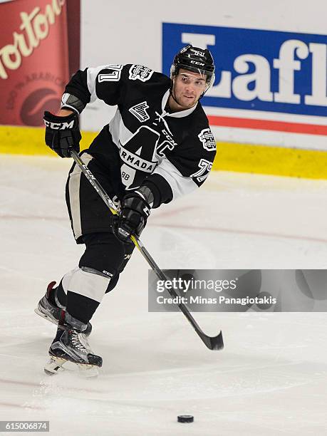 Guillaume Beaudoin of the Blainville-Boisbriand Armada passes the puck during the QMJHL game against the Saint John Sea Dogs at the Centre...