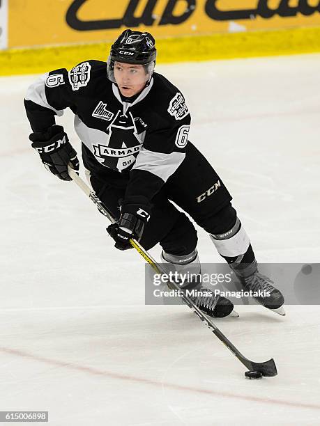 Antoine Crete-Belzile of the Blainville-Boisbriand Armada skates the puck during the QMJHL game against the Saint John Sea Dogs at the Centre...