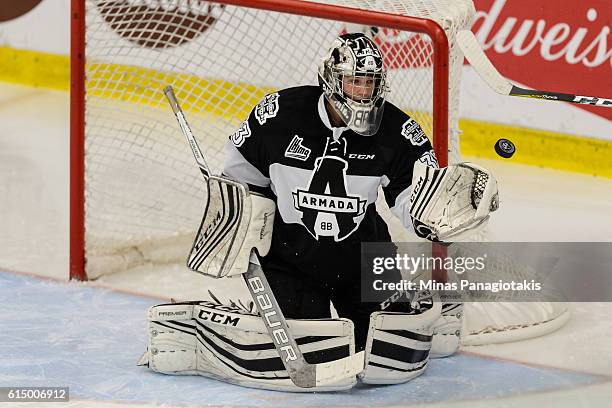 Samuel Montembeault of the Blainville-Boisbriand Armada makes a save during the QMJHL game against the Saint John Sea Dogs at the Centre d'Excellence...