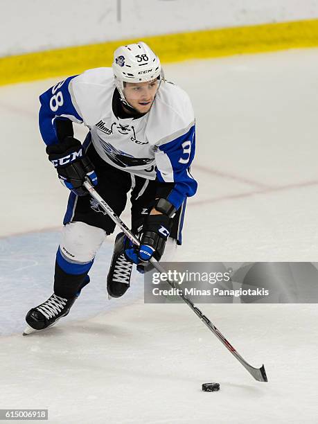 Jakub Zboril of the Saint John Sea Dogs skates the puck during the QMJHL game against the Blainville-Boisbriand Armada at the Centre d'Excellence...