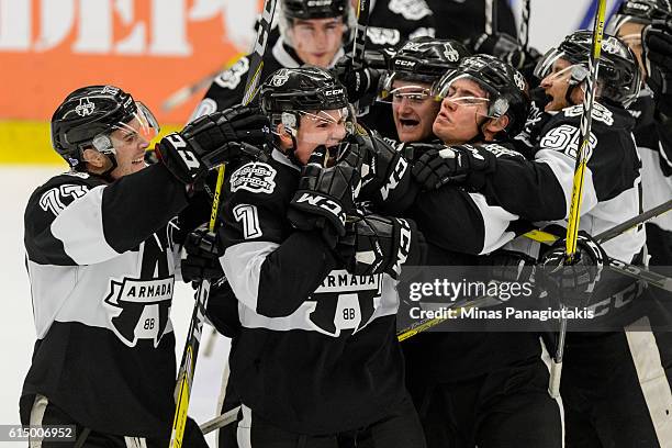Alexandre Alain of the Blainville-Boisbriand Armada celebrates his overtime goal with teammates during the QMJHL game against the Saint John Sea Dogs...