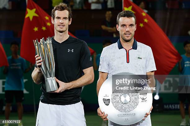 Andy Murray of Great Britain and Roberto Bautista Agut of Spain poses with their trophy after the Men's Single Final Match on day eight of Shanghai...