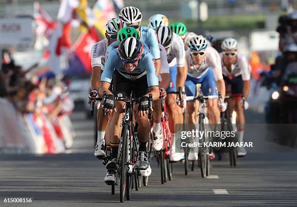 Belgium's Oliver Naesen leads the race during the men's elite road race event as part of the 2016 UCI Road World Championships on October 16 in the...